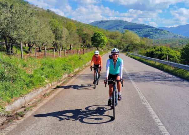 Two road cyclists riding Italy coast to coast on a guided cycling tour.jpg