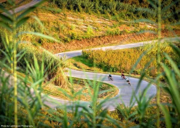 Road cycling winding road in Piedmont, Italy