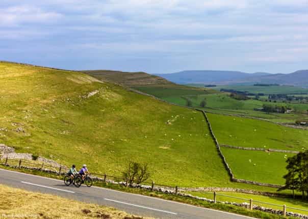 Two female cyclists riding LEJOG route on a cycling tour