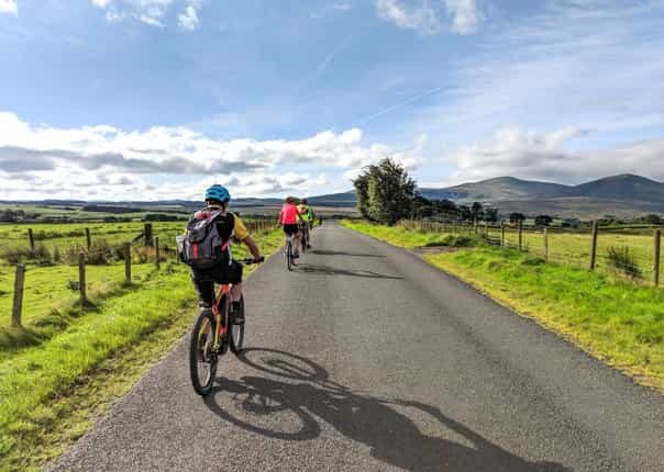 Cyclists riding the Coast to Coast (C2C) cycle route