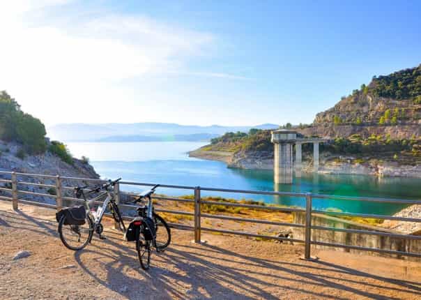 Two e-bikes at the GuadalcacÃ­n Reservoir in Andalucia